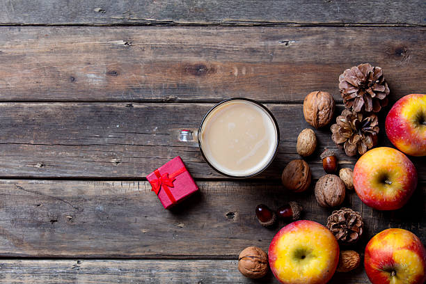 istock apples, fir-cones, cup of coffee, gift and nuts 546166946