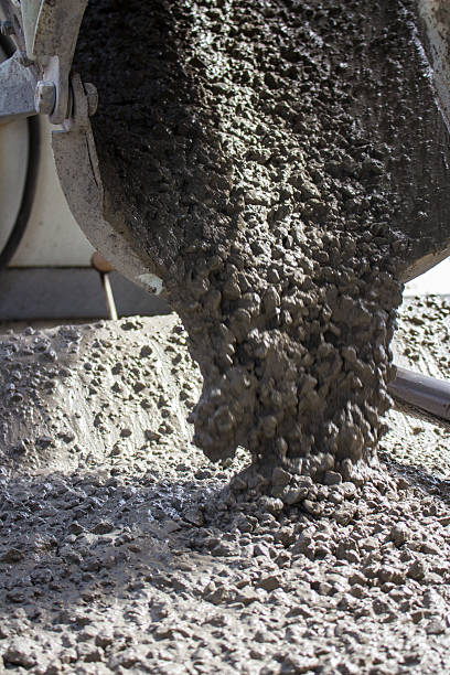 istock Pouring concrete on a dairy farm 546172914
