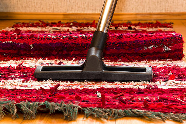 istock Professional vacuum cleaner brush frees the carpet from dust 546174748