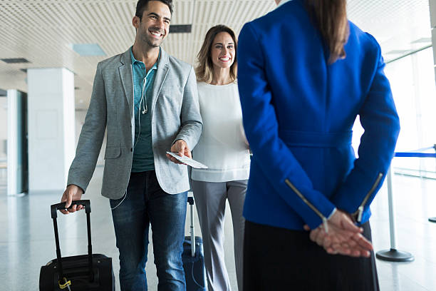 istock Business woman and man boarding plane. 546175506
