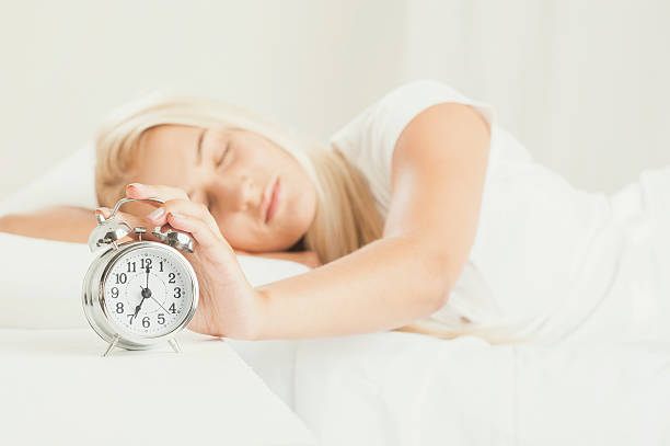 istock Attractive Smiling Young Woman Waking Up 546176700
