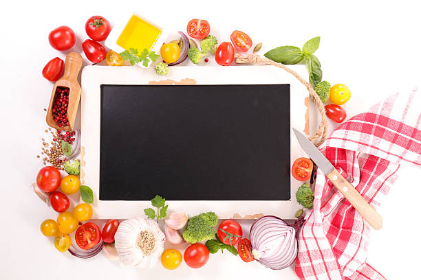 istock raw food and blackboard isolated on white 546176848
