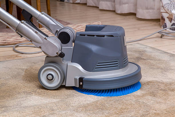istock Carpets chemical cleaning with professionally disk machine. Early spring cleaning. 546177384