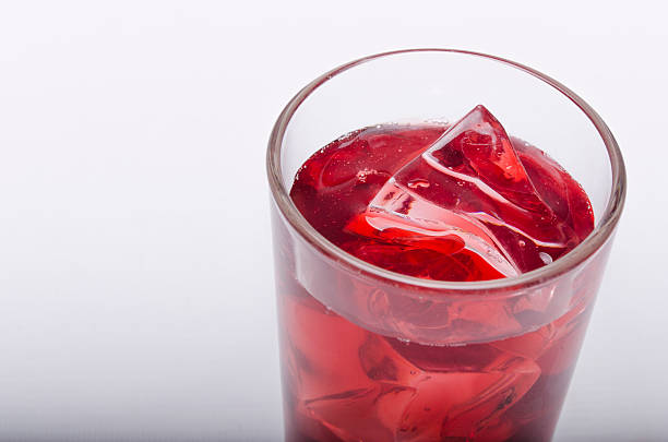 istock cherry juice with ice on a white background 546177986