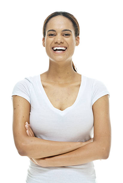 istock Cheerful casual man standing with arms crossed 546178832
