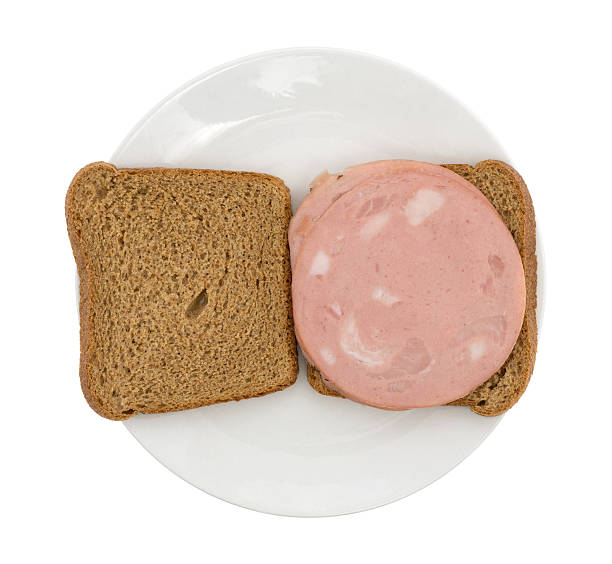 istock Mortadella sandwich on wheat bread upon a plate 546179242