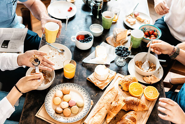 istock family having breakfast together at weekend 546179638