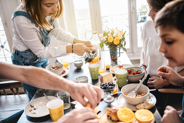 family having breakfast together at home