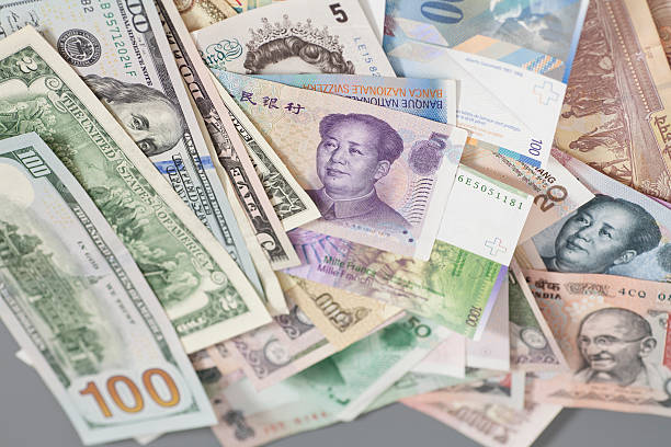 istock International currencies isolated on gray backgrond 546180898