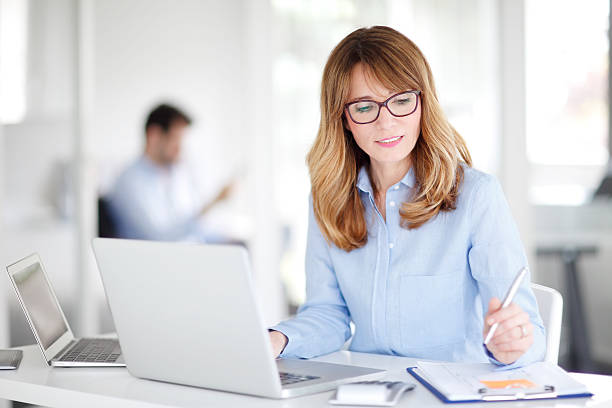 istock Middle aged professional woman 546184328