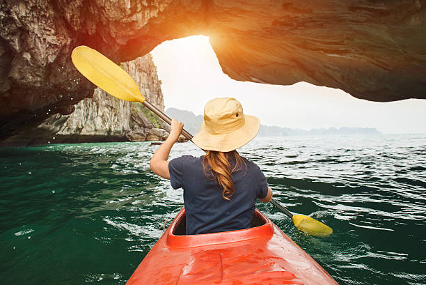 istock Woman explore Ha Long Bay on kayak 546185748