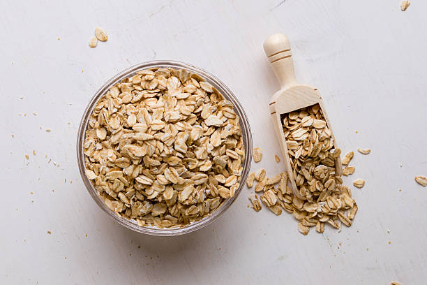 istock oat flakes in bowl and scoop 546186166
