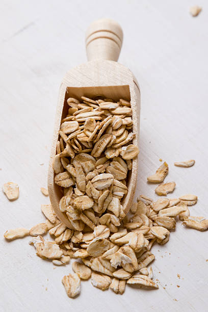 istock oat flakes with scoop 546186240
