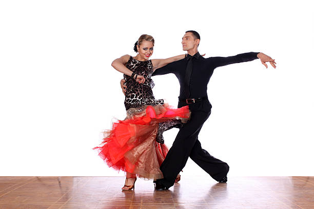 istock Latino dancers in ballroom against white background 546187148