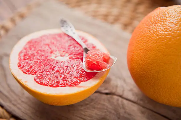 Pink grapefruit with sugar -  macro. Perfect helathy sumemr snack or breakfast.