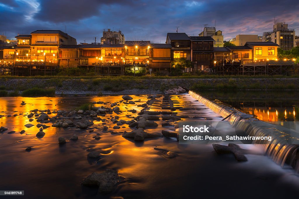 Kamogawa river nearby Gion in sunset Old house and restaurant in Kamo river or kamogawa river at sunset, Gion, Kyoto, Japan Kamo River Stock Photo