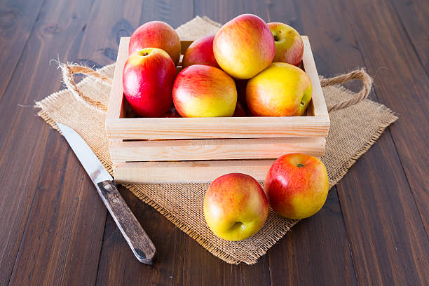 Apples in a wooden crate. Apples in wooden crates placed on the wooden floor. ragweed stock pictures, royalty-free photos & images