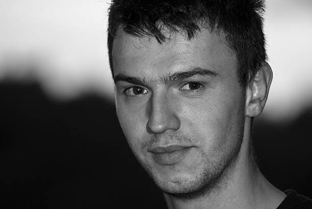 istock young handsome man closeup portrait 546193704