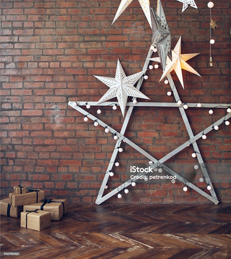 Christmas background with stars and presents Christmas background with stars and presents over brick wall Entertainment Tent Stock Photo