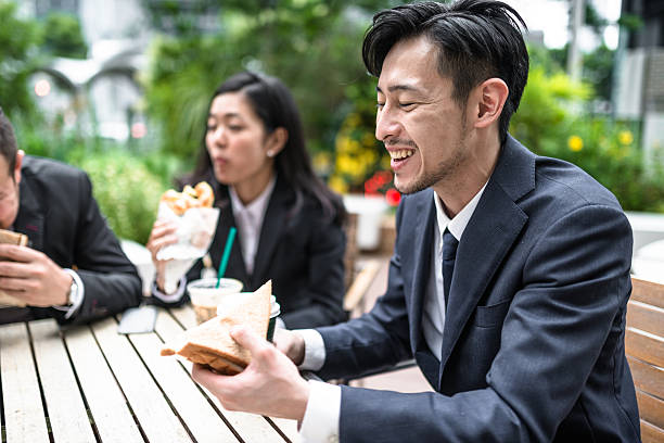 istock japanese Business people doing the lunch break 546196830