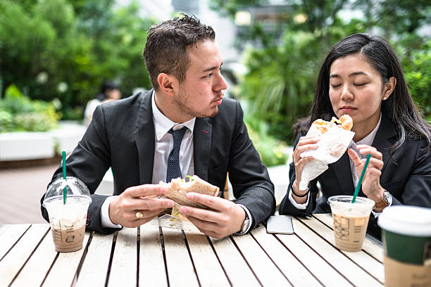 istock japanese Business people doing the lunch break 546197048