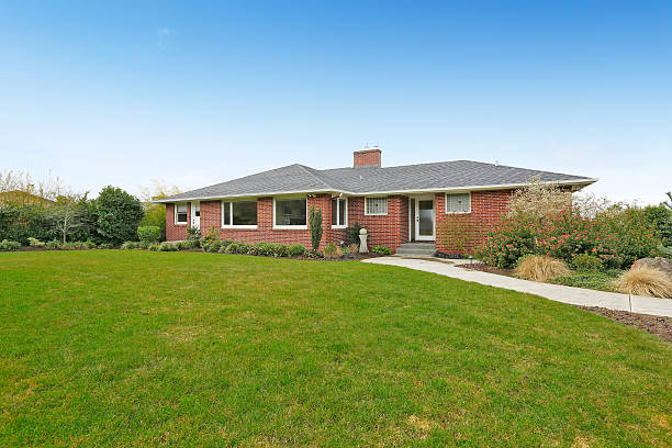 istock Red brick house with tile roof. Front view 546197300
