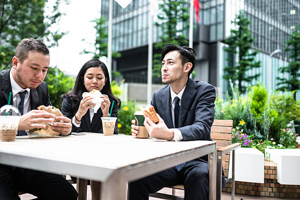 istock japanese Business people doing the lunch break 546197462
