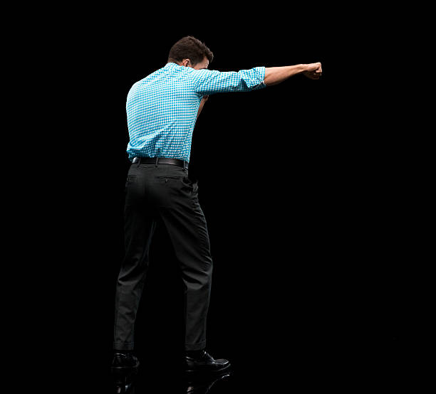 istock Rear view of businessman fighting 546197720