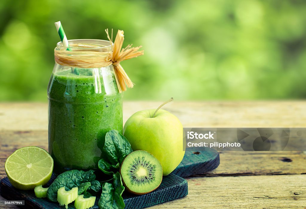 Healthy green smoothie in the jar Healthy green smoothie in the jar  Smoothie Stock Photo
