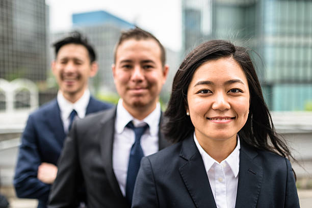 istock Business japanese team standing togetherness 546198474