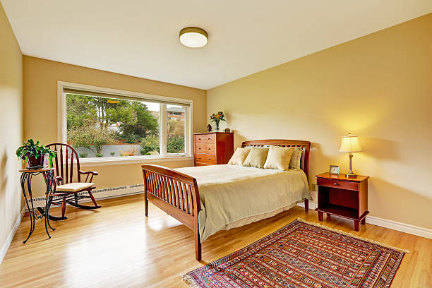 istock Bedroom with hardwood floor, bright walls 546198768