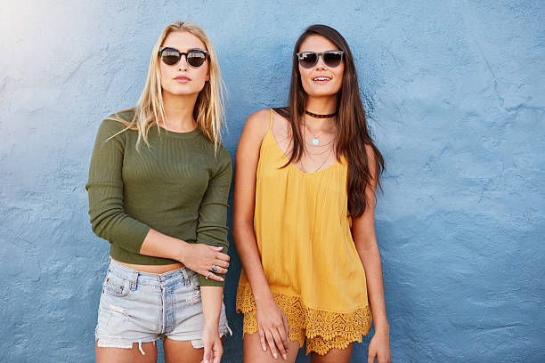 istock Stylish young women standing together 546200222