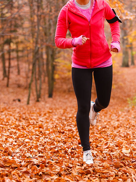 istock Young sporty girl doing exercises in forest. 546201078