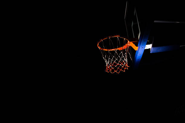 istock Basketball hoop on black background 546201360