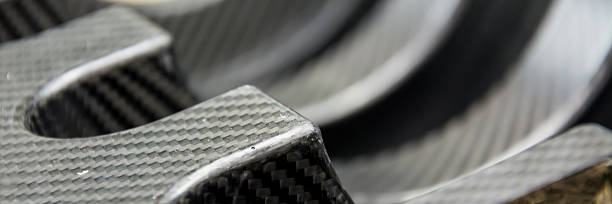 istock Carbon fiber composite raw material background 546202732
