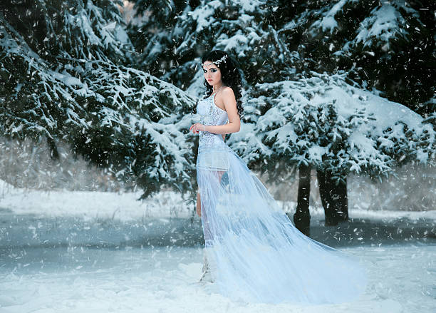 istock Luxurious brunette in a white dress 546204294