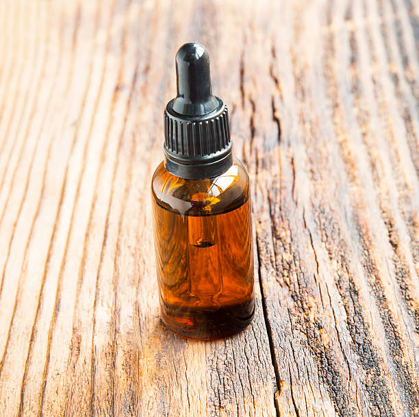 istock Essence/Aromatherapy oil bootle on wooden background 546206484