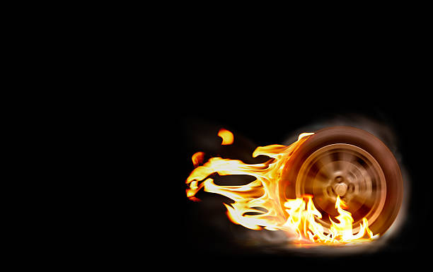 Blue car racing spinning wheel burns rubber on floor. Car racing spinning wheel burns rubber on fire.Blue car racing spinning wheel burns rubber on floor. car burnout stock pictures, royalty-free photos & images