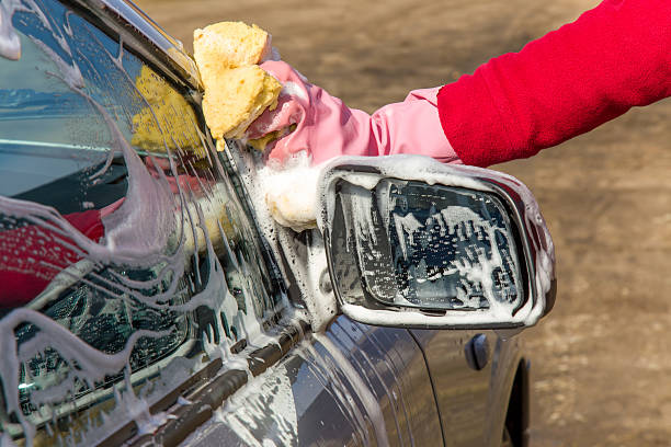 istock Professional car wash by hands.  Early spring cleaning. 546207714