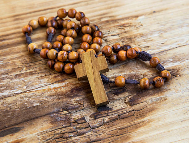 istock Wooden crucifix with rosary 546209660