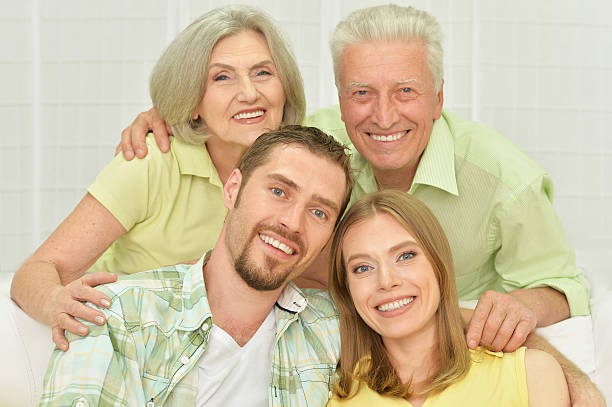 istock young couple  with senior parents 546210606