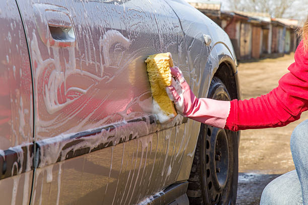 istock Professional car wash by hands. . Early spring cleaning. 546421732