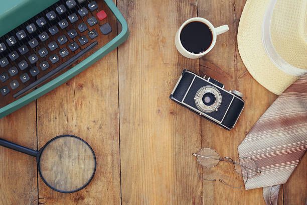 istock Detective concept. Private Detective tools on wooden table 546423450