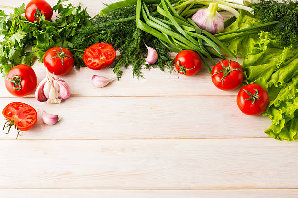 istock Fresh vegetables on the white wooden background 546425662