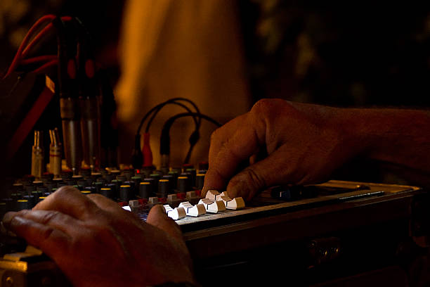 istock Hands and electronic sound mixer on stage 546426742