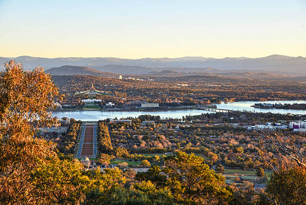 Sunset on Canberra City, autumn, Brindabella hills Canberra, Australia, 12 June 2016. From Mount Ainslie, it a strategic position to enjoy the sunset over Canberra city and the Brindabella hills. canberra photos stock pictures, royalty-free photos & images