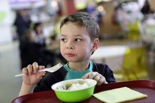 istock Child eating meat dumplings 546427348