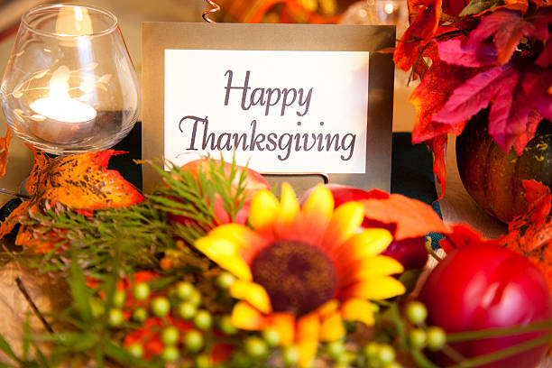 istock Happy Thanksgiving place setting. Autumn flower centerpiece. Table. 546432582