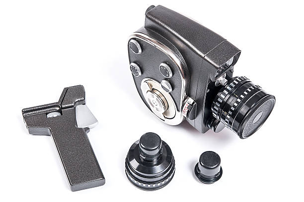 istock Vintage movie camera and two additional lens isolated on white 546433342