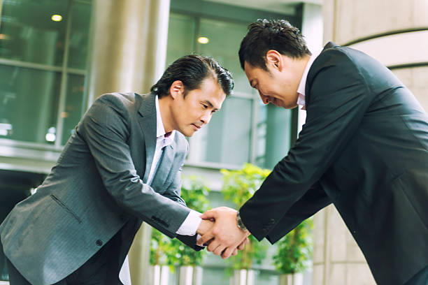 istock Hand shake of two Japanese businessman 546433890